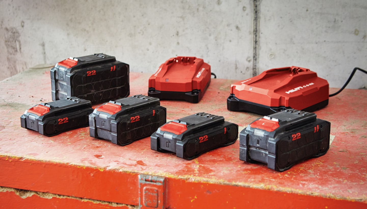Nuron portfolio of all 5 batteries and 2 chargers in a warehouse / tool crib