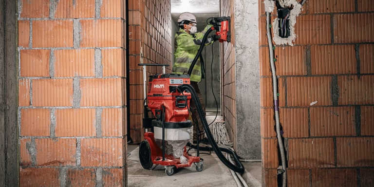 For virtually dust-free results combine tools like the DG 150 concrete grinder with a vacuum cleaner