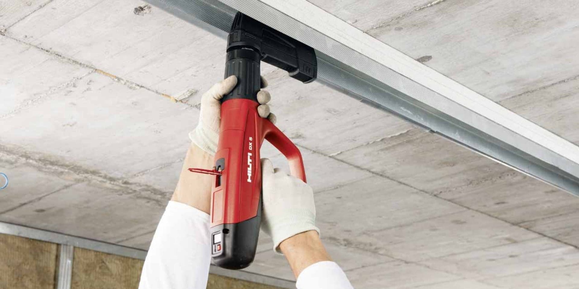 DX 5 power-actuate tool for overhead fastening