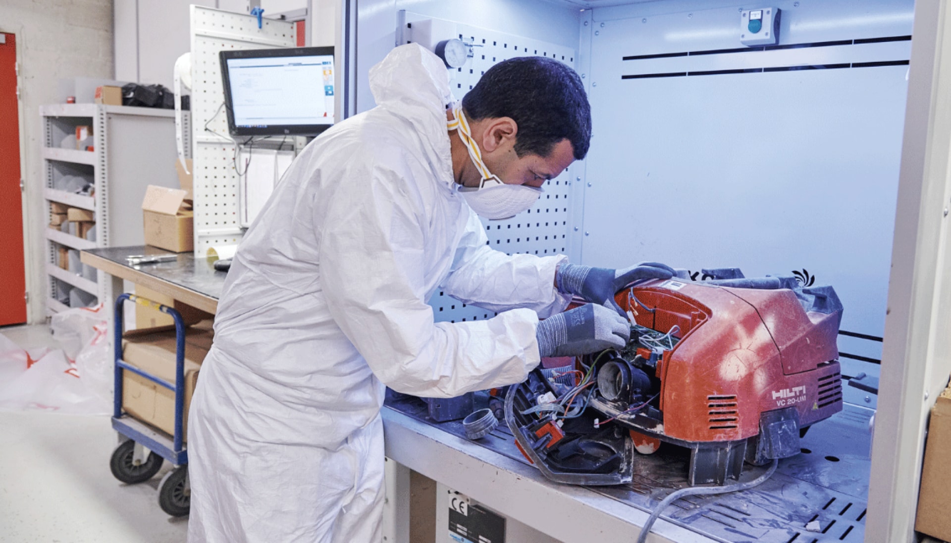 A Hilti service technician repairs a Hilti vacuum cleaner