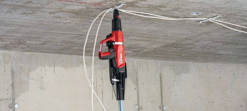 Image 6 of 13: DX 6-F8 Powder-actuated nailer Fully automatic, highly versatile powder-actuated nailer for single fasteners Applications 1