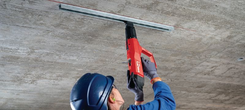 Image 5 of 13: DX 6-F8 Powder-actuated nailer Fully automatic, highly versatile powder-actuated nailer for single fasteners Applications 1