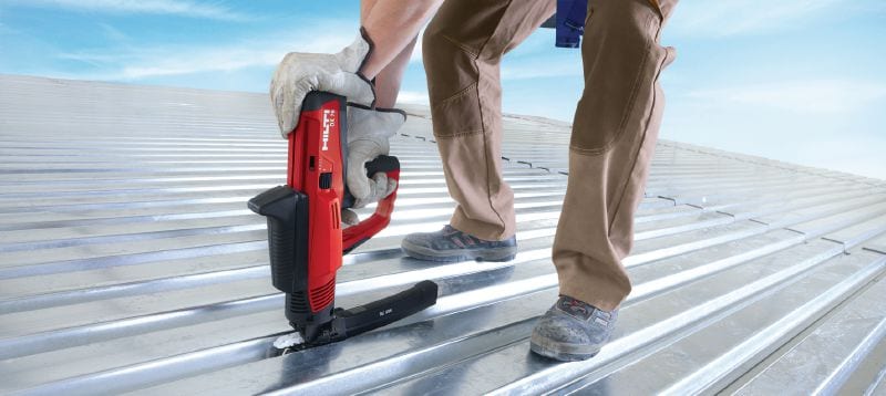 Image 2 of 4: DX 76 Powder-actuated tool Semi-automatic, high-productivity, powder-actuated nailer for fastening metal decks Applications 1