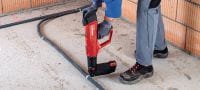 Go to slide 13 of 13: DX 6 MX Powder-actuated nailer with magazine Fully automatic powder-actuated nailer with magazine for fastening collated nails Applications 11