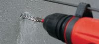 Go to slide 6 of 10: TE-CX (SDS Plus) 公制電鎚鑽鑽頭 終極 SDS plus (TE-CX) 電鎚鑽鑽頭，含 4 面碳化鎢刀刃，用於對鋼筋混凝土鑽錨銓孔 應用 1
